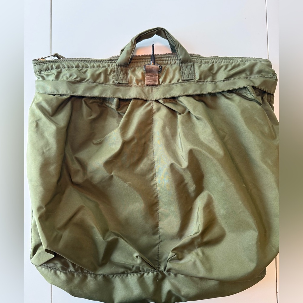 Vintage.  Military bag, flyer’s helmet.